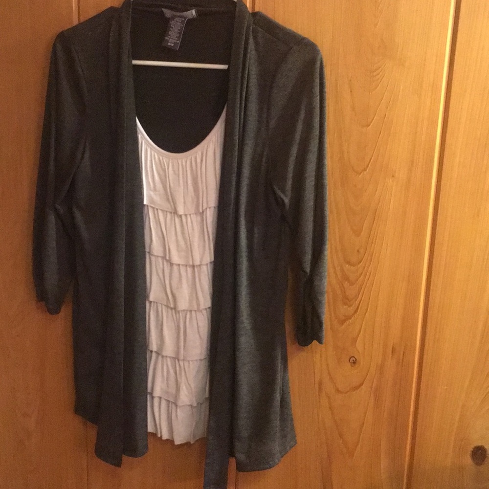 White tank top with black/grey shirt over  tank.